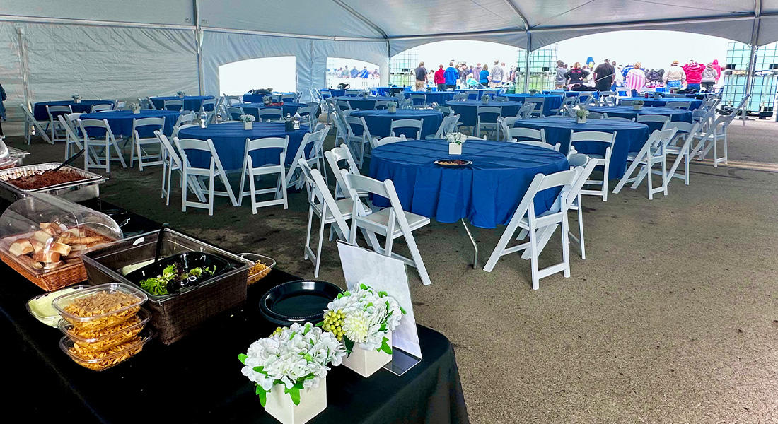 Columbus Air Show Aces Club - Round covered tables, restricted area, buffet style food.  Shaded seating area.