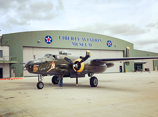 B-25J Mitchell “Georgie’s Gal” parked in front of Liberty Aviation Museum hangar