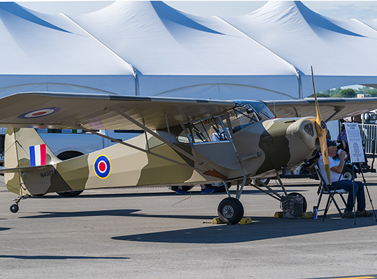 Taylorcraft BC-12D light aircraft parked for display